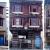 Williams Block exterior before and during construction